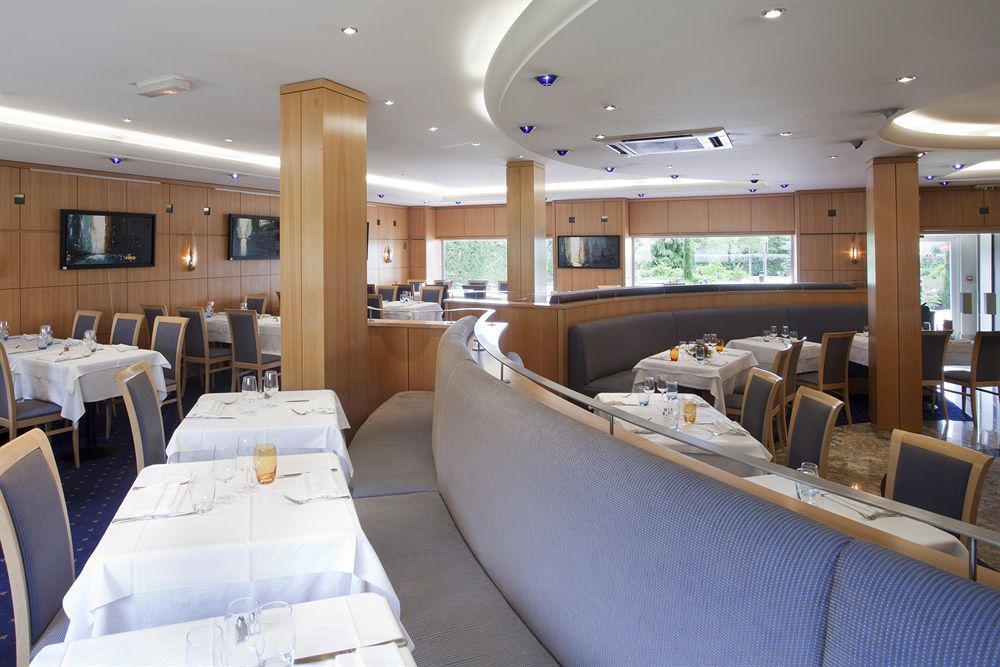 日内瓦圣热尼普伊阿德吉奥公寓式酒店 图瓦里 餐厅 照片